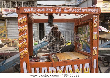 DELHI INDIA - JUN 7 : indian style ice cream bar cart stall in chawri bazar in old delhi of delhi on june 7 2015 india.