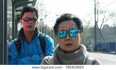 Asian Chinese Tourist Travel In Europe During Hoiday. Famous Destination Of Visitor From Asia