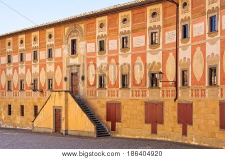 The Curved Yellow and Orange Facade of Palazzo del Seminario - San Miniato Tuscany Italy