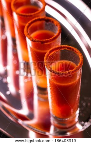 Bloody Mary Cocktail With Chili Pepper, Ice And Celery.