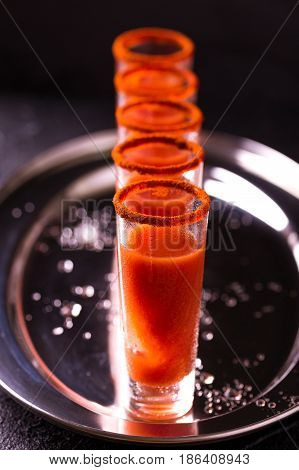 Bloody Mary Cocktail With Chili Pepper, Ice And Celery.