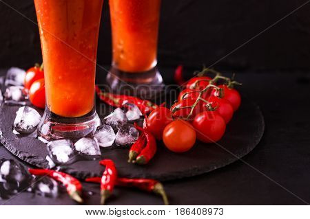Bloody Mary Cocktail With Chili Pepper, Ice And Celery.