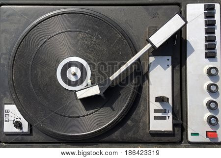Dirty obsolete retro vinyl player top view
