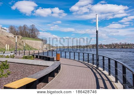 Quay along river in Narva town. Estonia Europe. Russian town Ivangorod at the distance