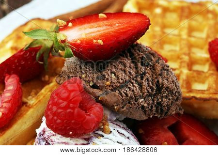 Belgian Waffles With Ice Cream, Caramel Sauce And Fresh Berries