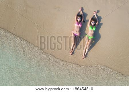 Asian lady model slepp and relax on the beach with top view from drone summer and holiday concept