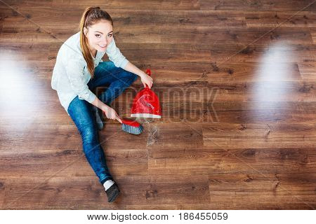 Cleaning Woman Sweeping Wooden Floor