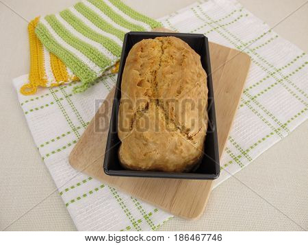Fresh homemade soda bread in baking tin
