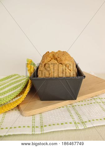 Fresh homemade soda bread in baking tin