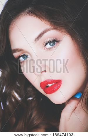 Beautiful woman skin with red lips on white background