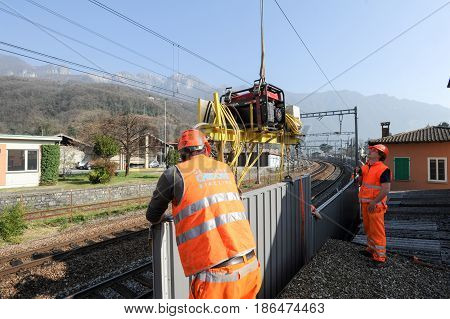 Workers During The Installation Of Noise Barriers On The Railway