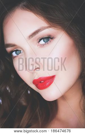 Beautiful woman skin with red lips on white background