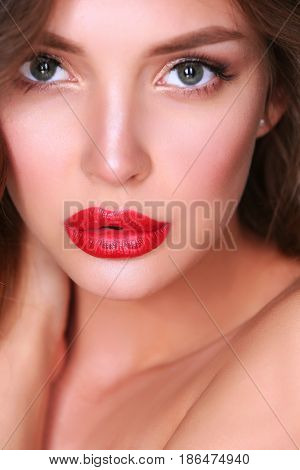 Beautiful woman skin with red lips on white background
