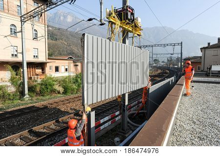 Workers During The Installation Of Noise Barriers On The Railway