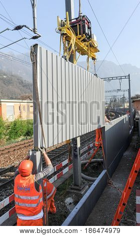 Workers During The Installation Of Noise Barriers On The Railway