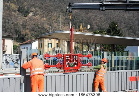 Workers During The Installation Of Noise Barriers On The Railway