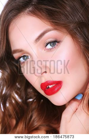Beautiful woman skin with red lips on white background