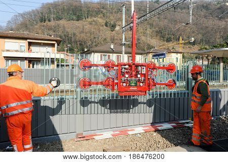 Workers During The Installation Of Noise Barriers On The Railway