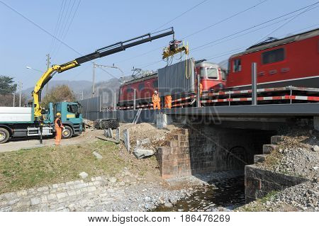 Workers During The Installation Of Noise Barriers On The Railway