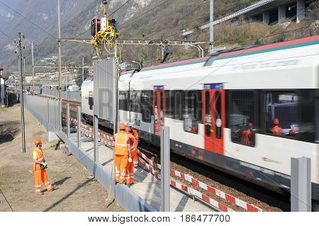 Workers During The Installation Of Noise Barriers On The Railway