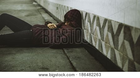 Homeless Woman Sleeping on The Floor