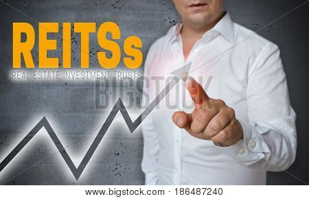 REITs touchscreen is operated by man Background