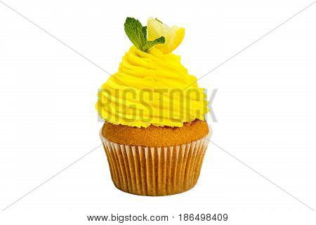 Lemon yellow cupcake with mint isolated on white background.