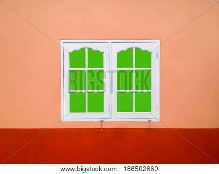 white window frame on a orange wallgreen screen with clipping path