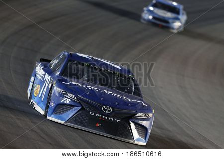 May 13, 2017 - Kansas City, Kansas, USA: Martin Truex Jr. (78) brings his car through the turn during the Go Bowling 400 at Kansas Speedway.