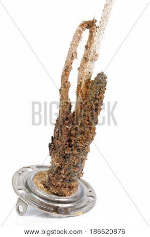 heating element of water heater with scum and sediment isolated on white background