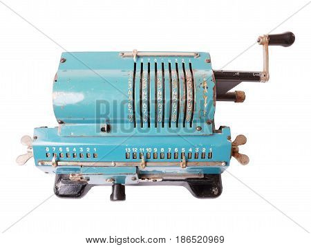 Old blue calculating machine isolated on a white background. Top view.