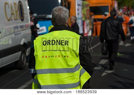 BERLIN - MAY 01 2016: Members of the security services. Members of trade unions workers and employees at the demonstration on the occasion of Labour day.