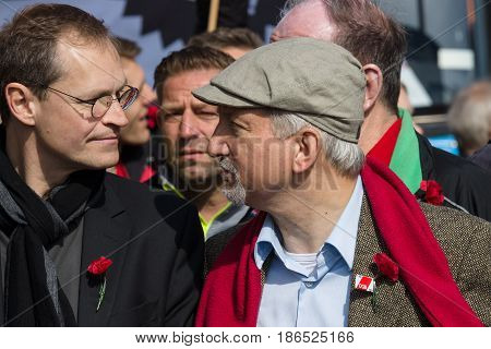 BERLIN - MAY 01 2016: Governing Mayor of Berlin Michael Mueller (left). Members of trade unions workers and employees at the demonstration on the occasion of Labour day.