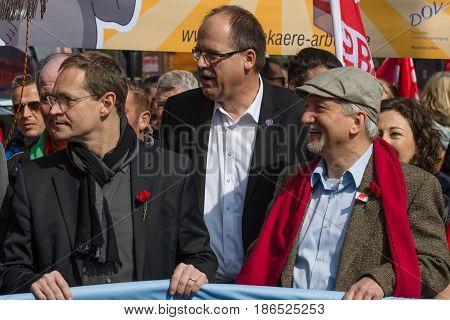 BERLIN - MAY 01 2016: Governing Mayor of Berlin Michael Mueller (left). Members of trade unions workers and employees at the demonstration on the occasion of Labour day.
