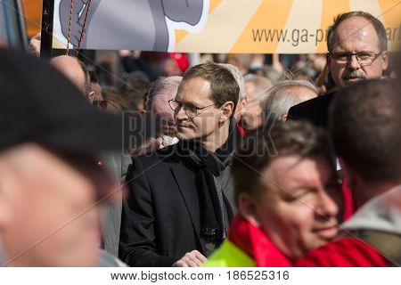 BERLIN - MAY 01 2016: Governing Mayor of Berlin Michael Mueller (center). Members of trade unions workers and employees at the demonstration on the occasion of Labour day.