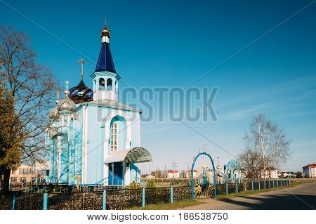 Village Krasnoe, Gomel Region, Belarus. Old Orthodox Church Of The Assumption At Sunny Spring Day. Famous Landmark.
