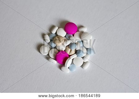 Heap of colorful medicines on the desk