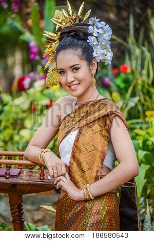NAKORN PHANOM THAILAND - FEBRUARY 14 2015: Thai northeastern Phutai dancer with traditional costume in Phutai world event day in Renunakorn of Nakorn Phanom Thailand.