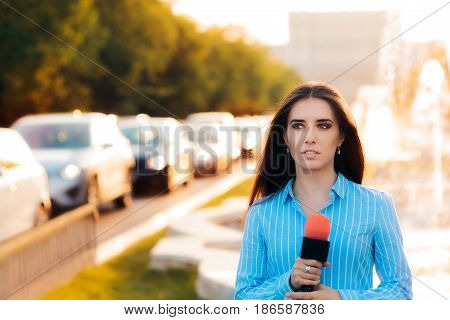 Female News Reporter on Field in Traffic