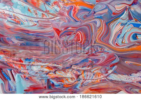 Liquid marble style abstract paint background. Fluid painting texture. Colorful mix of acrylic vibrant colors.