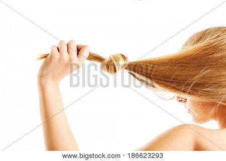 Blonde hair knot isolated on white background.