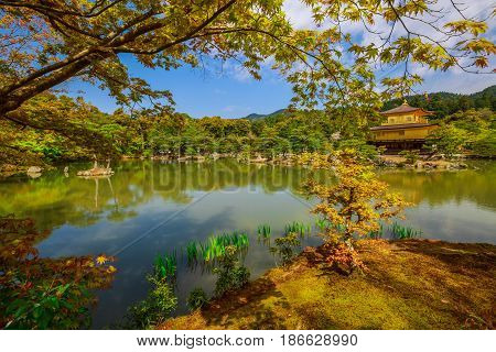 Scenic landscape of famous landmark and Unesco site of Kyoto, Kinkakuji or Rokuonji. The Golden Pavilion, whose top two floors are completely covered in gold leaf, is a Zen temple of Rinzai sect.