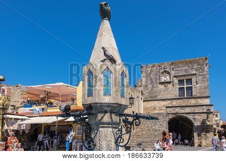RHODES GREECE - JULY 4 2015: Sintrivani Fountain on Hippocrates Square in the historic old town
