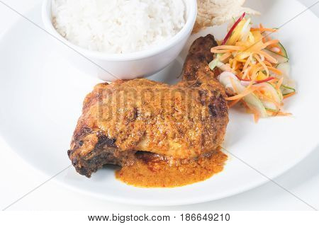 Classic Chicken Rendang with rice and vegetable pickles