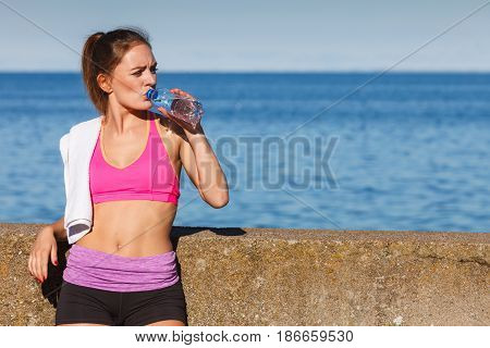 Woman Drinking Water After Sport Gym Outdoor
