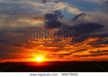 Beautiful summer sunset over a provincial town. Shooting from out of town