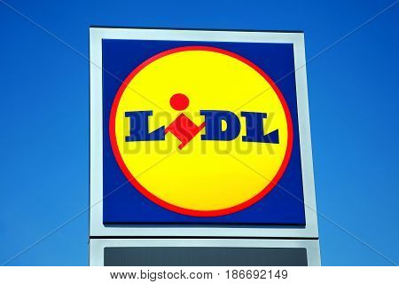Llanelli, Wales, UK - May 8, 2017:  Lidl logo advertising sign at its retail supermarket stores in just outside the town centre