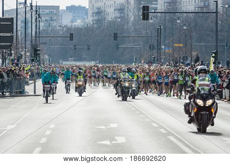 BERLIN - APRIL 03 2016: The annual Berlin Half Marathon. Race through the city streets. Start of the marathon.