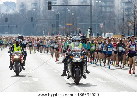 BERLIN - APRIL 03 2016: The annual Berlin Half Marathon. Race through the city streets. Start of the marathon.