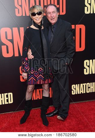 LOS ANGELES - MAY 10:  Eric Idle and Tania Kosevich arrives for the 'Snatched' World Premiere on May 10, 2017 in Westwood, CA